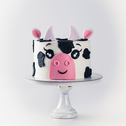 Cute cow themed cake