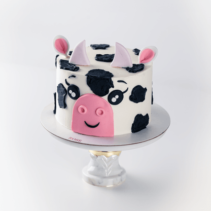 Cute cow themed cake